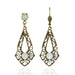 Opalina Crystal Earrings by Anne Koplik Designs featuring a vintage-inspired design with a white opal crystal centerpiece and accentuated by ornate brass detailing. Perfect for versatile occasions.