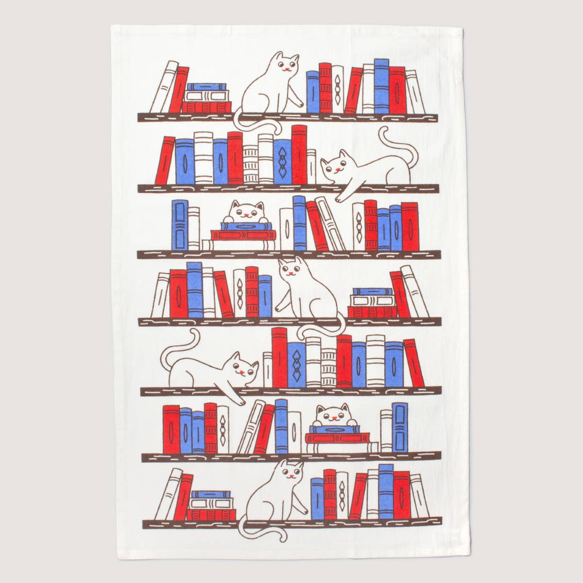 Cat on a bookshelf tea towel