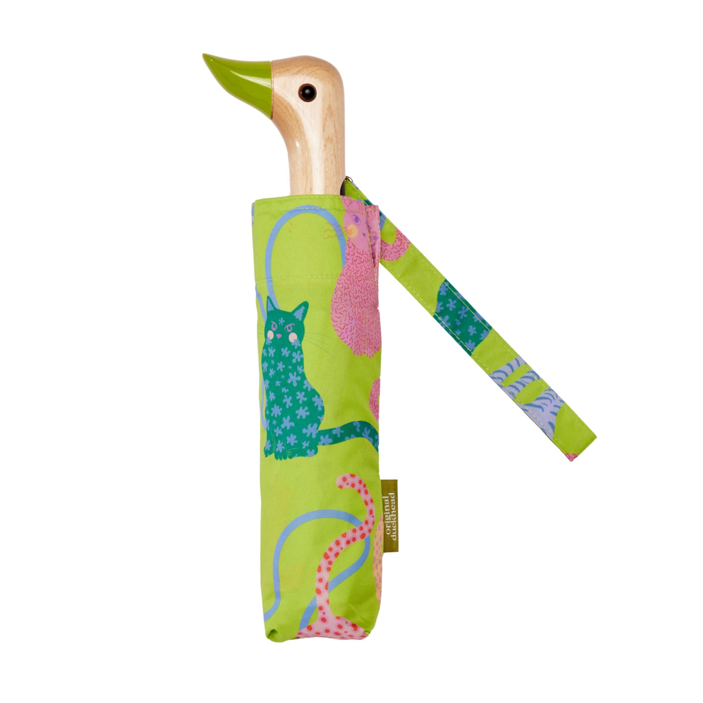 Arty Cats Duck Umbrella with a lime green cat design and a sustainably sourced birch wood duck-head handle by Original Duckhead USA.