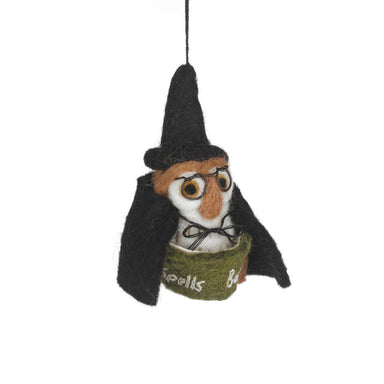 Felt owl ornament wearing a black hat and green sweater 