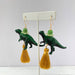 dinosaur tassel earrings