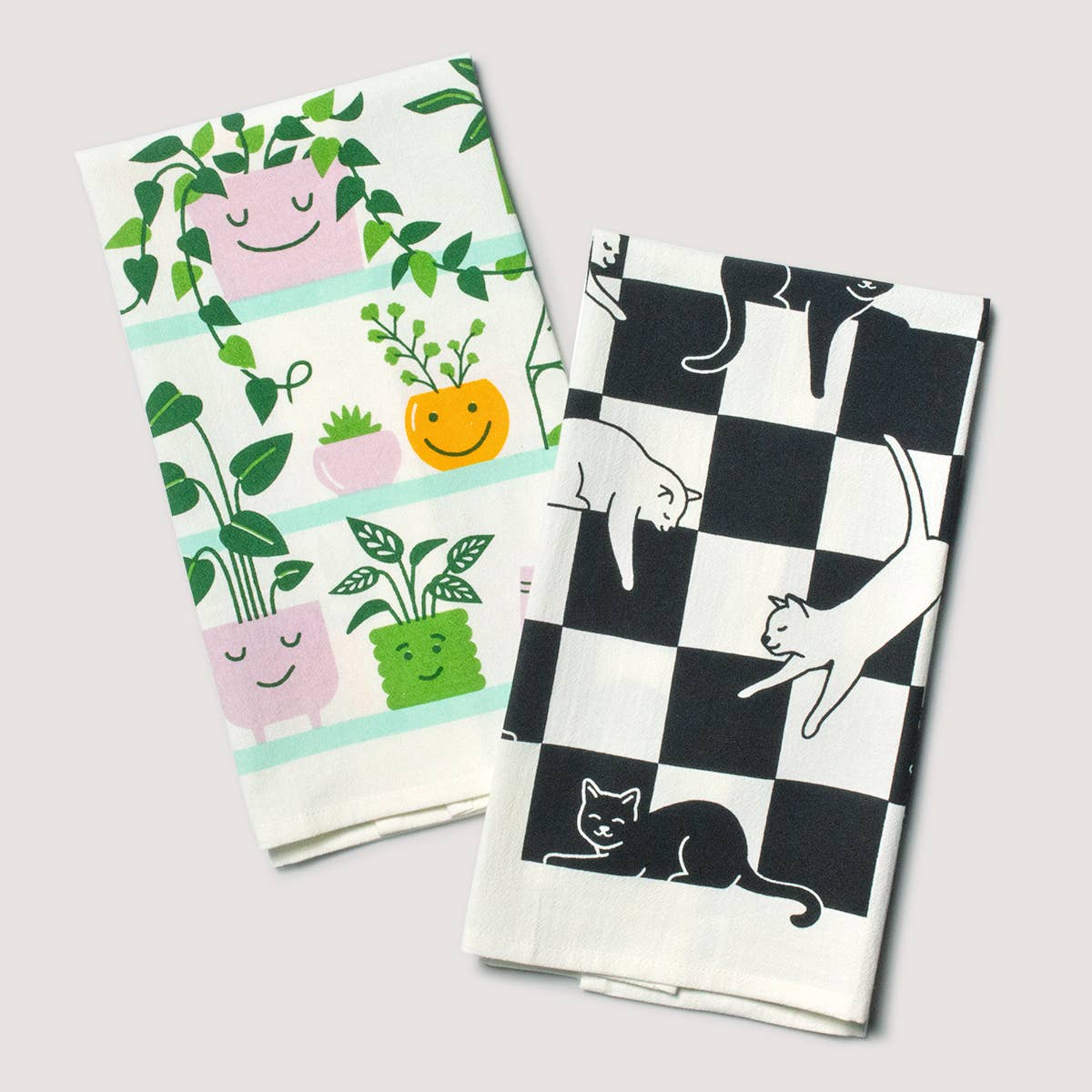 2 tea towel with plants or cats