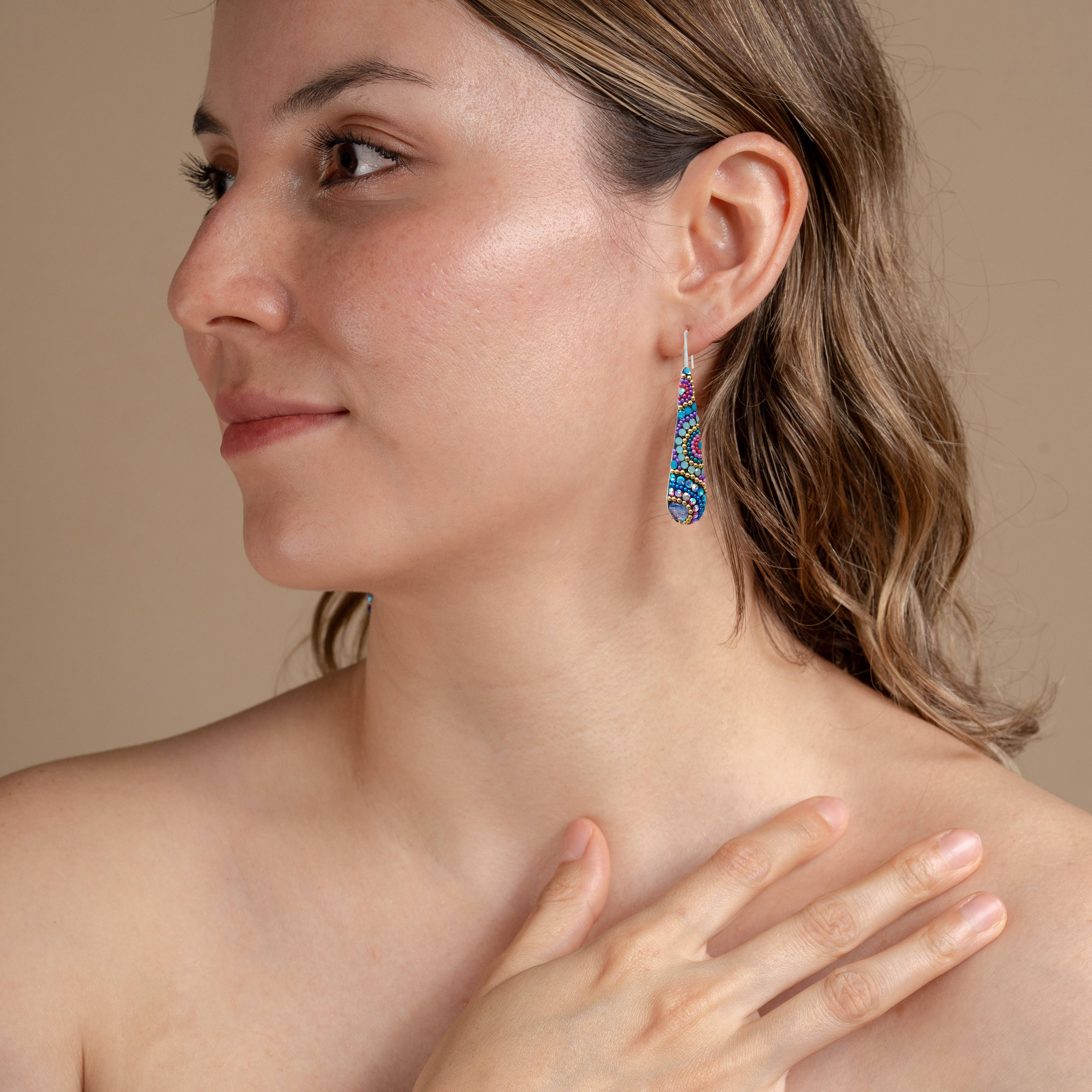 Flat lay of Crystal & Silver Drop Earrings, showcasing their design and versatility for everyday wear.