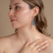 Flat lay of Crystal & Silver Drop Earrings, showcasing their design and versatility for everyday wear.