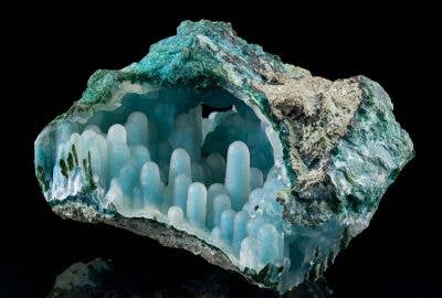 Natural aqua chalcedony stone formation, showcasing the beauty of the gemstone used in the handmade Sterling Silver Aqua Chalcedony Necklace by Whitelotus Design.