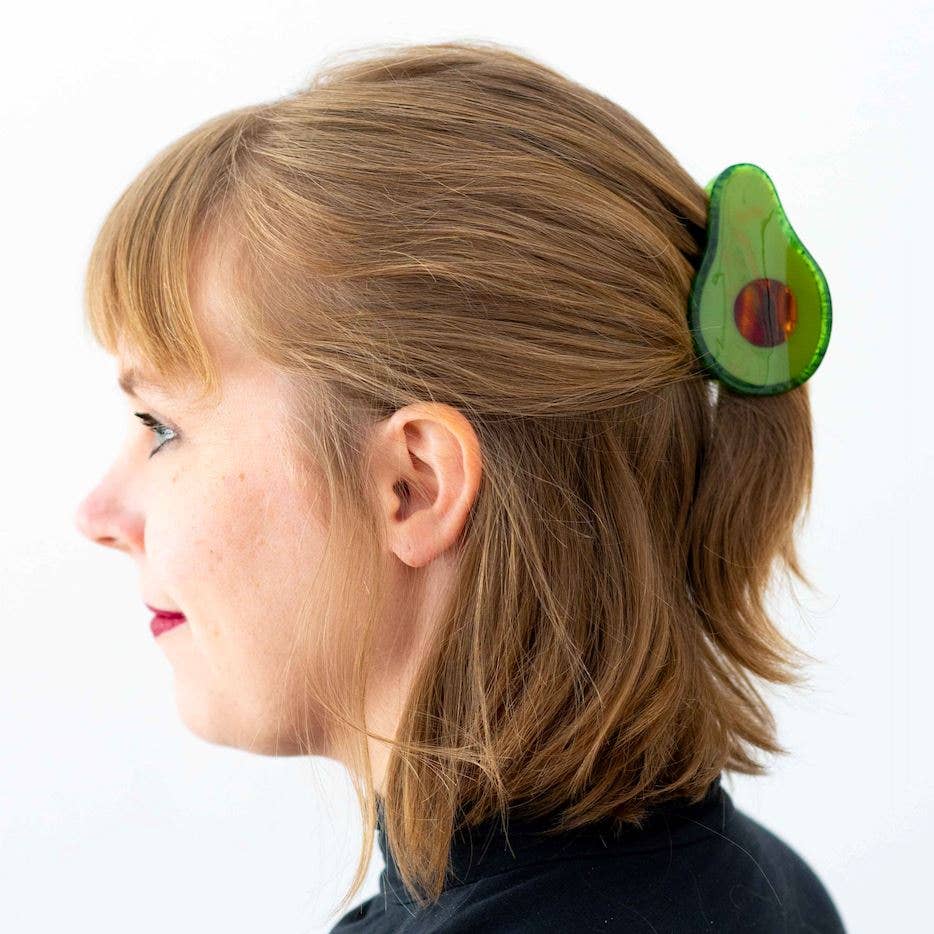 Woman wearing avocado hair clip