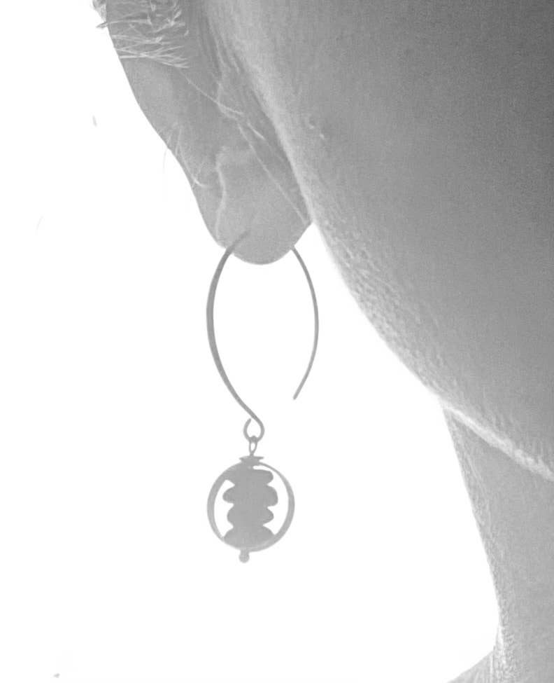 Alternate view of Silver Rock Stack Dangles by Suzanna Garrett Designs — tiny river stones are drilled, stacked, and given a little room to swing