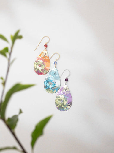 Close-up of Cynthia Earrings by Holly Yashi, capturing a floral dream in niobium – because your love life deserves these sparkling gems!