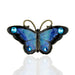Elegant Crystal Butterfly Brooches designed by Anne Koplik, featuring intricate enamel work and embellished with shimmering crystals, symbolizing endurance and hope.