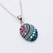 Mosaico Jewels Petite Oval Pendant in Crystal & Silver showcasing intricate colorful design, perfect for any outfit.