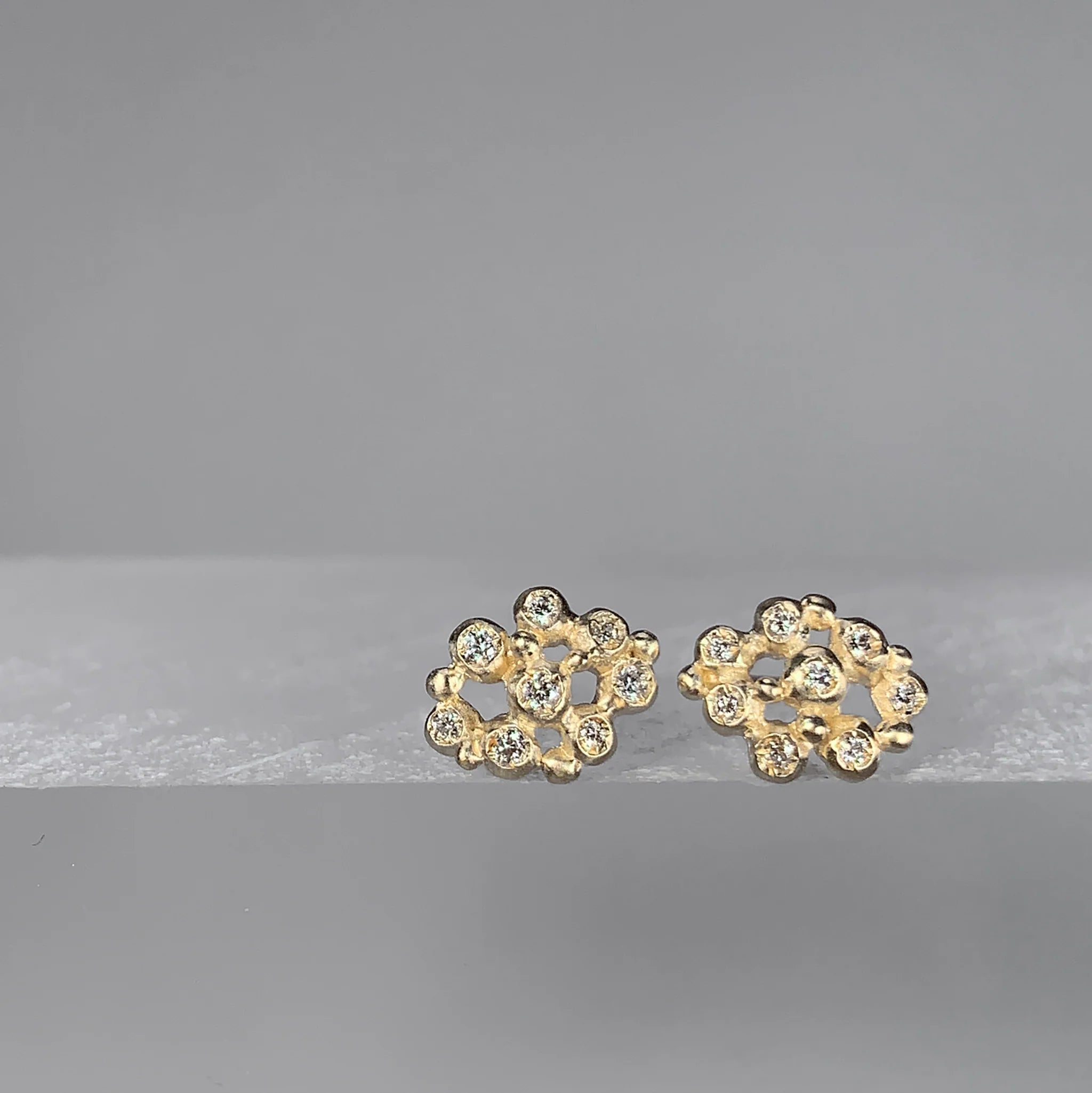 Gold earrings with gemstones 