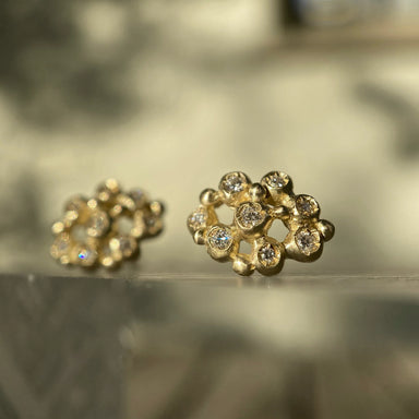Gold earrings with gemstones 