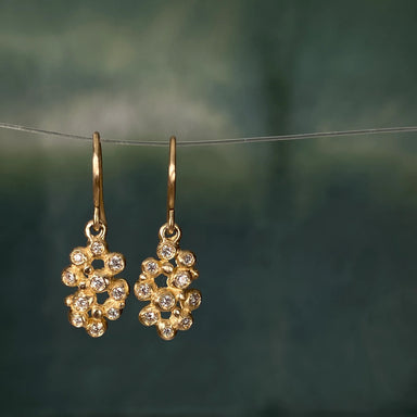 Gold drop earrings with gemstones 