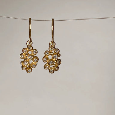 Gold drop earrings with gemstones 