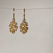 Gold drop earrings with gemstones 