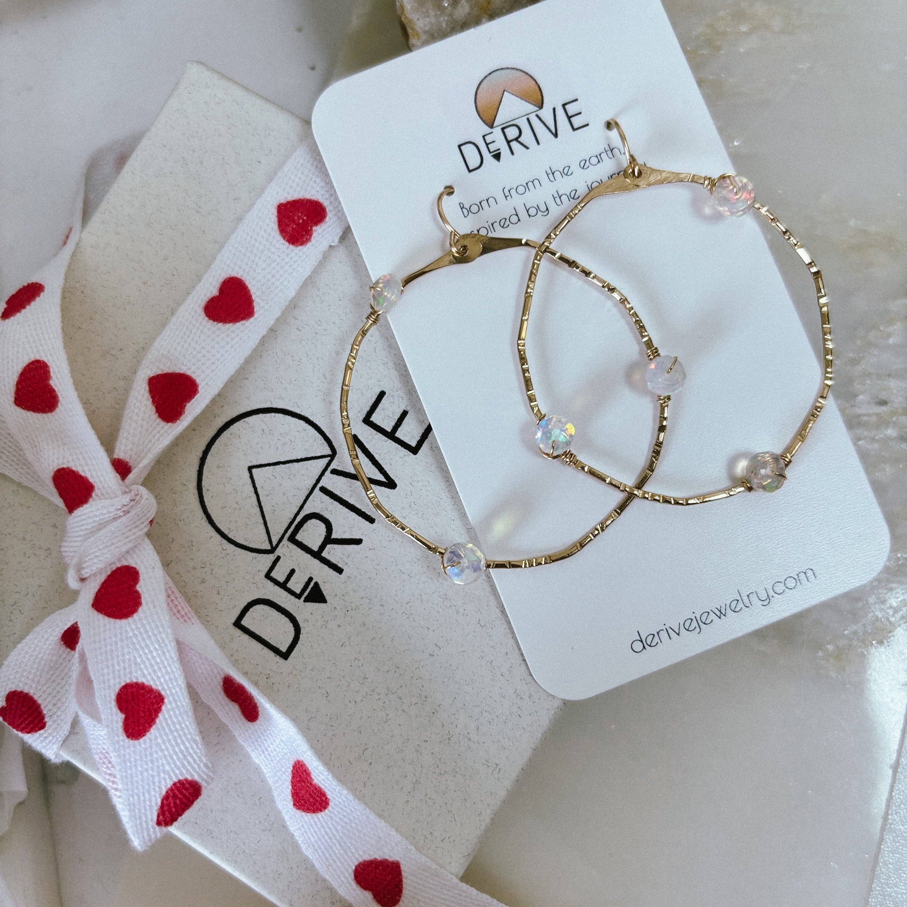 Wear the Stargazer Opal Hoop Earrings and let the world know that you've reached optimal sparkle status! Ideal for those who take their glamour seriously, yet still like to have fun.