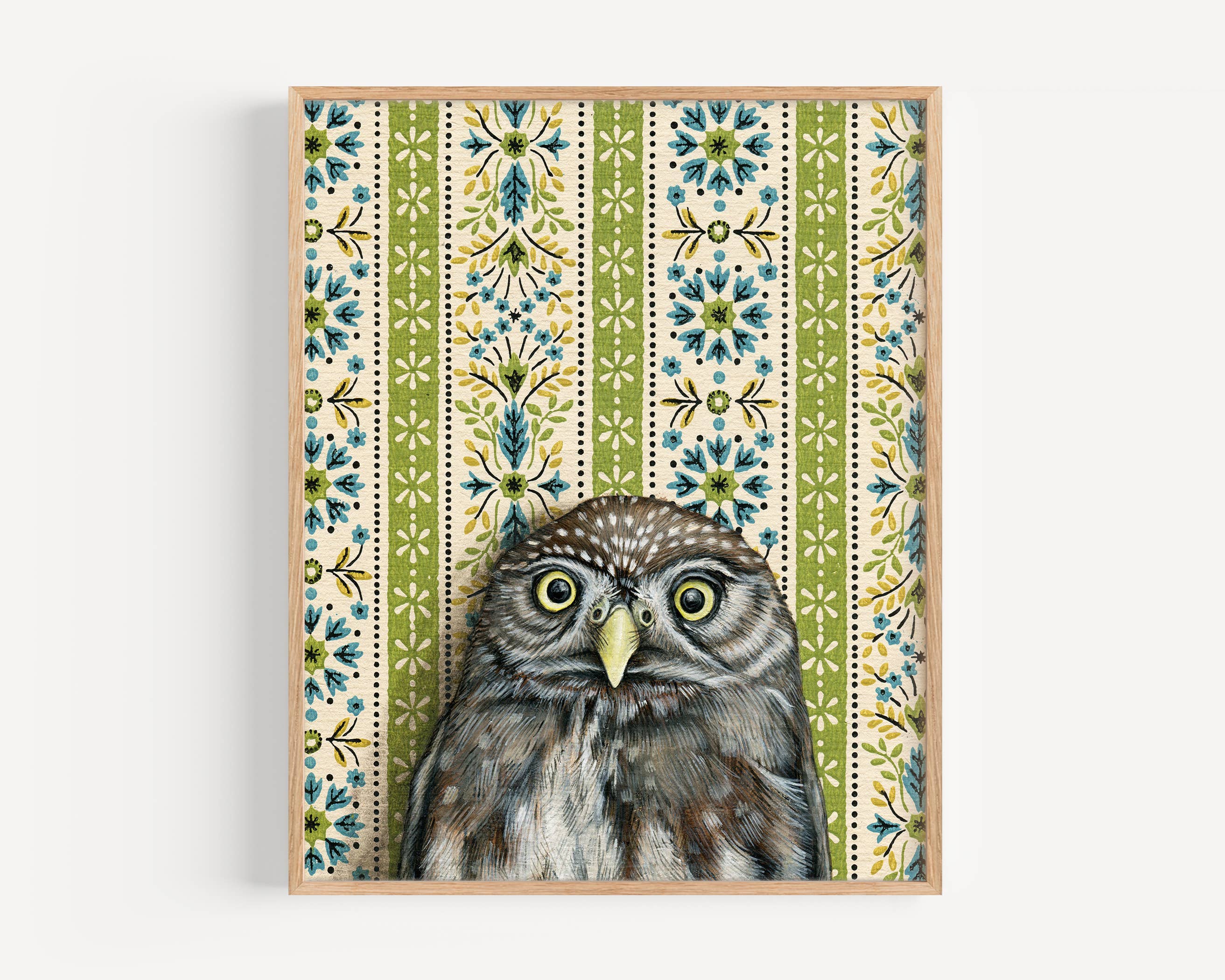 Framed art print of an owl on a patterned background
