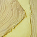 Detailed view of a hand marbled softcover notebook with yellow-toned marbled paper, created by The Casual Bookbinder.