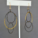 Long Link Earrings by Metamorphosis Metals - lightweight statement earrings featuring blackened steel links forged to perfection and adorned with shimmering 23k gold leaf. Ideal for making a bold fashion statement, just remember to avoid pool parties!