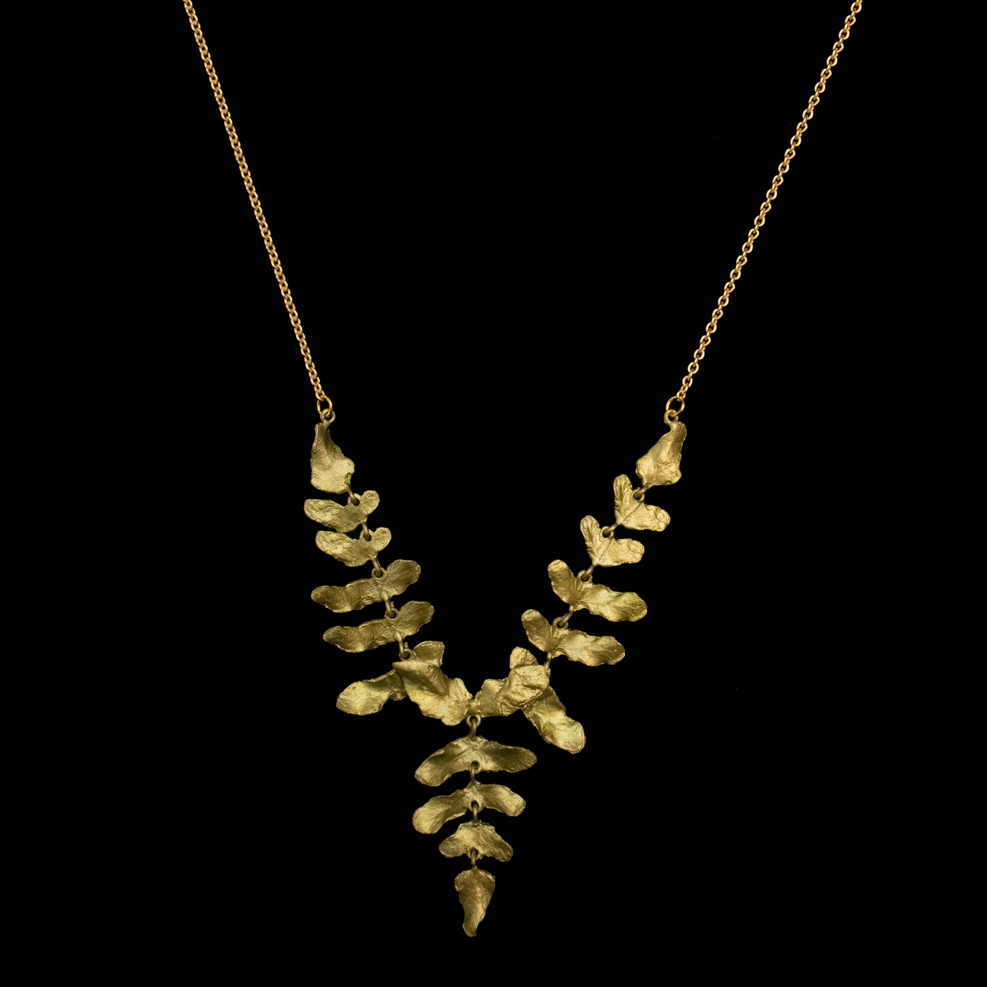 Meadow Fern 16" Adjustable Necklace by Michael Michaud featuring a cast bronze pendant with a hand patina finish, showcasing intricate botanical details and authentic foliage textures.