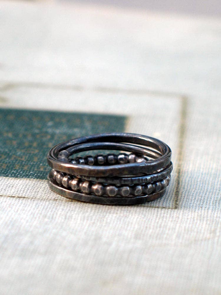 Quirky Silver Stacking Rings - set of 4, the best way to express your inner magpie! Each one sports its own unique texture, so get ready to mix and match!