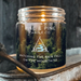 The delightful 9oz Petrichor Rain Soy Wax Candle by Rise and Pine Candle Co. showcasing a joyful dance of cotton wicks ready to bring you over 40 hours of misty joy!