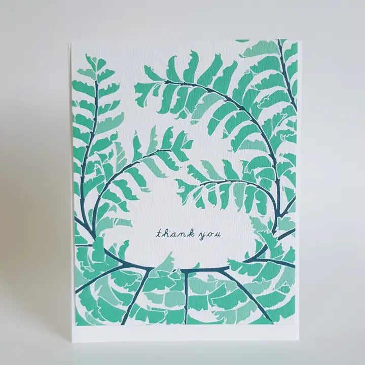 Little Green Card Collection presented with plant-based plastic sleeve, highlighting eco-friendly materials and women-owned studio craftsmanship.