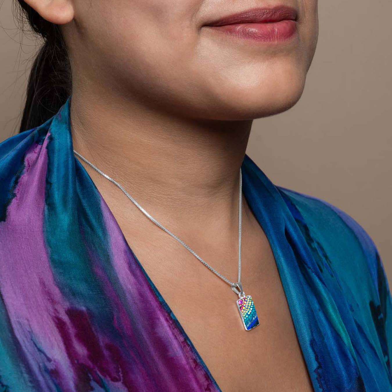 Sparkle Streak Pendant by Mosaico Jewels, a hand-crafted crystal and silver jewelry piece that offers a playful yet elegant design, perfect for layering or wearing solo.