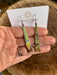 Creative presentation of Triangle Stick Earrings by Positive Shine Jewelry, perfect for complementing any outfit.