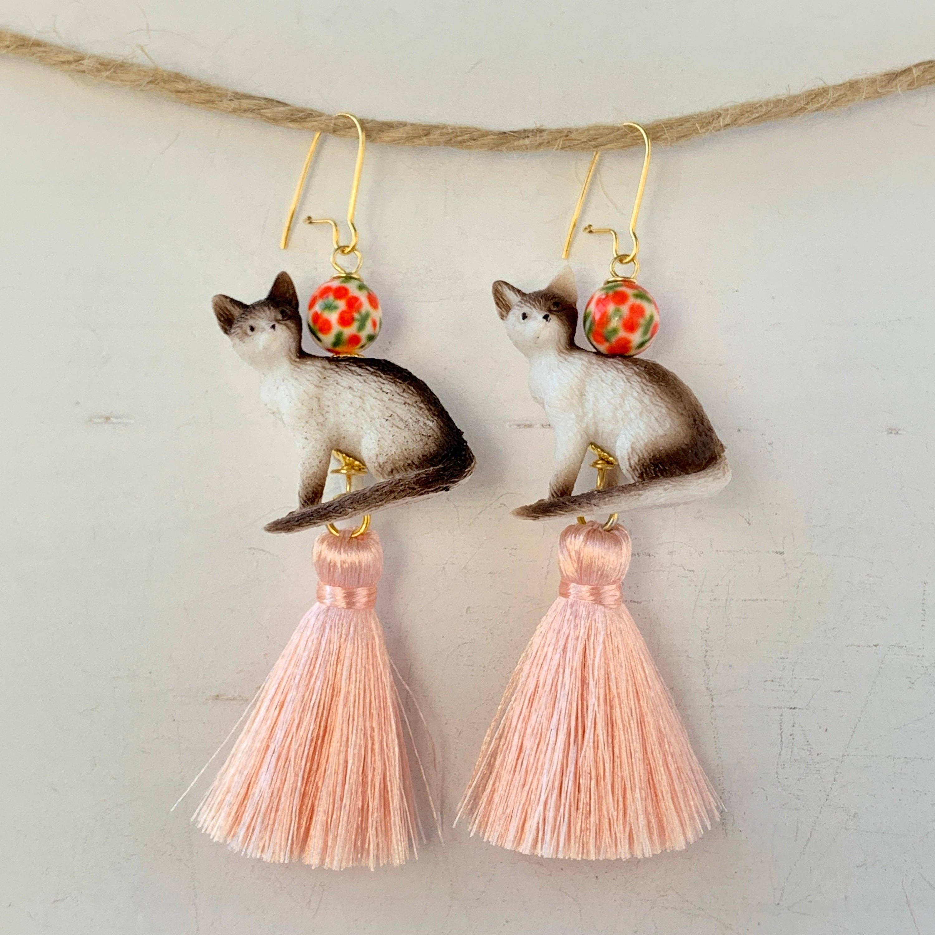 cat drop earrings with pink tassel