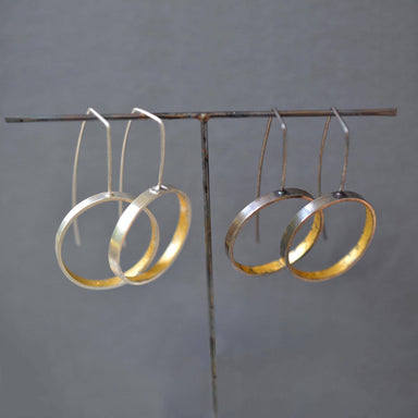 Modern Gold & Silver Circle Hoop Earrings - The secret to your stylish success, these hoops blend contemporary design with a cheeky pop of yellow gold for the ultimate ‘ear’ candy!