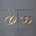 Modern Gold & Silver Circle Hoop Earrings - The secret to your stylish success, these hoops blend contemporary design with a cheeky pop of yellow gold for the ultimate ‘ear’ candy!