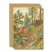 Moose and bear riding bikes down a hill blank greeting card