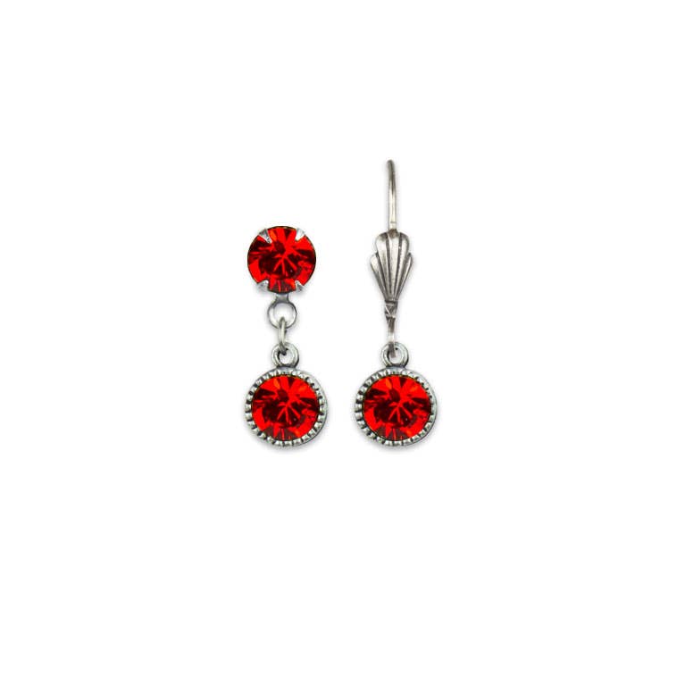 Pair of silver drop earrings with red gemstones