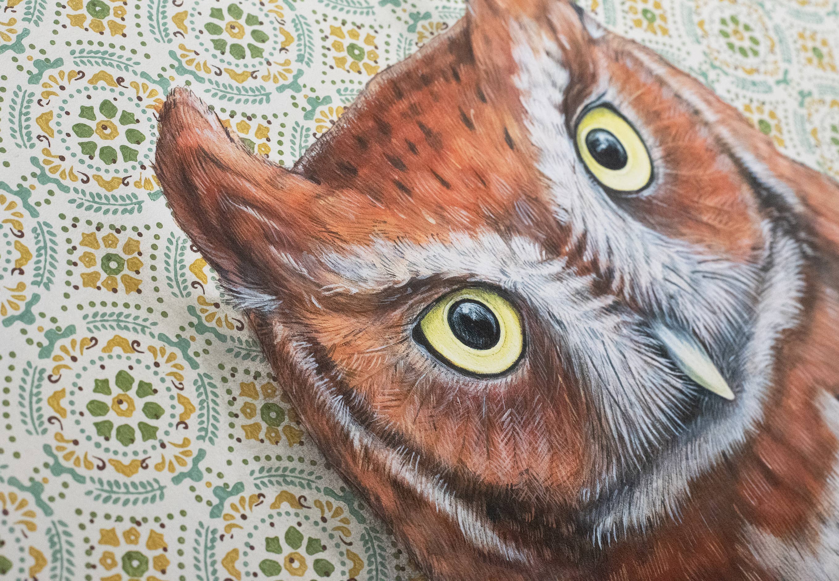 Framed art print of an owl on a patterned background