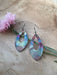 Pointed Teardrop Fire Painted Copper Earrings showcasing vibrant colors and unique shape, perfect for adding a stylish finish to any outfit.