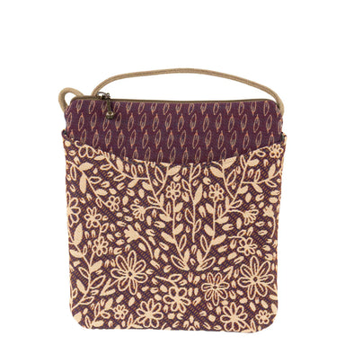 Stylishly showcasing the Cupcake bag's back zip pocket, perfect for hiding your secret candy stash!