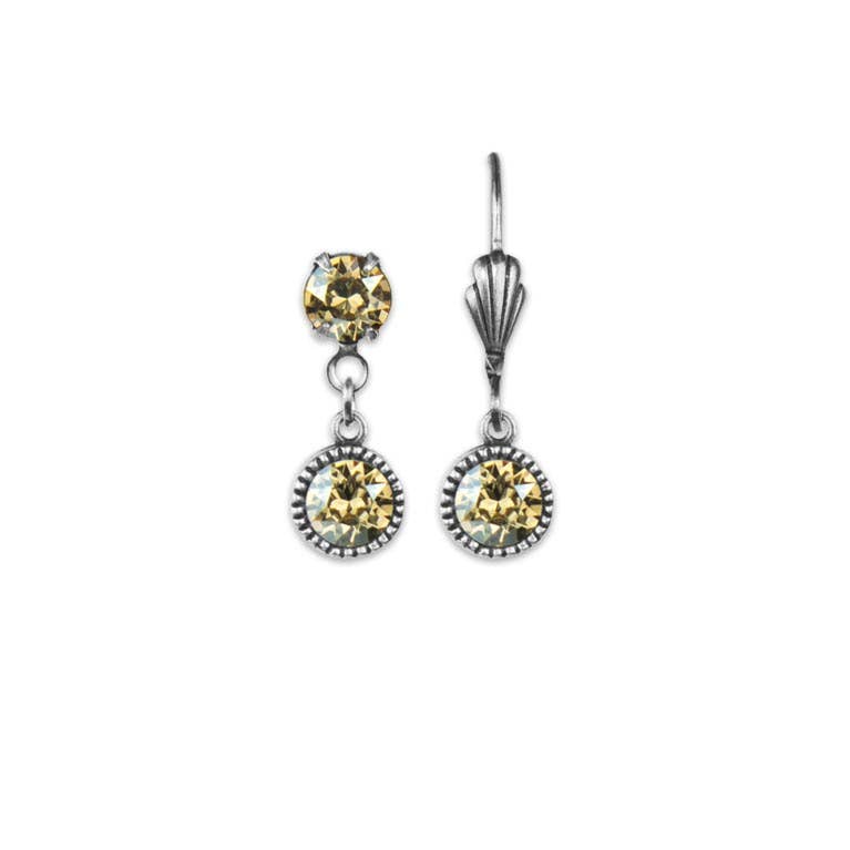 Pair of silver drop earrings with yellow gemstones