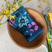 New Fullbloom Napkin Set folded elegantly, showcasing its machine washable fabric for easy care.