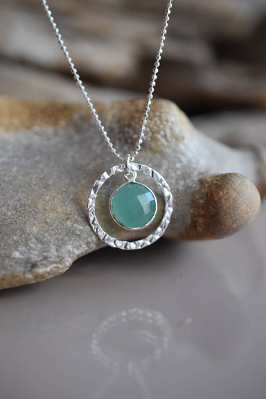 Sterling Silver Aqua Chalcedony Necklace by Whitelotus Design, featuring a hand-textured circular bezel surrounding a soft translucent aqua chalcedony gemstone, perfect for everyday wear.