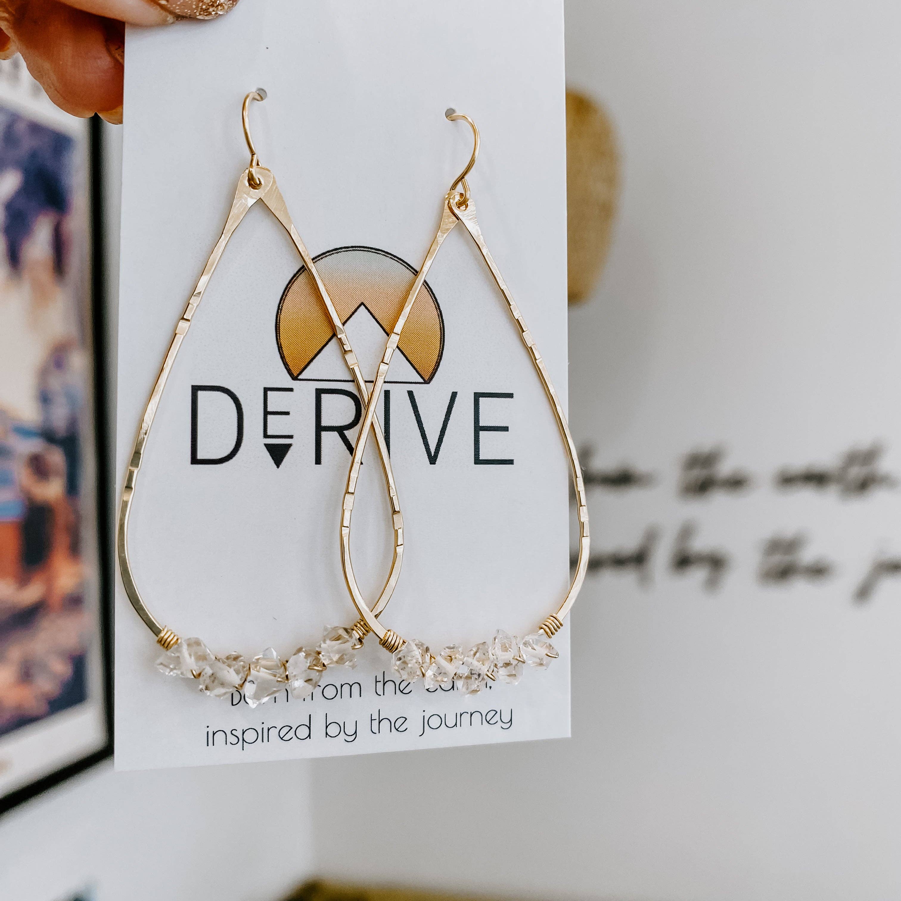 Herkimer Diamond Teardrop Earrings hanging elegantly, ready to sparkle brighter than your social life!