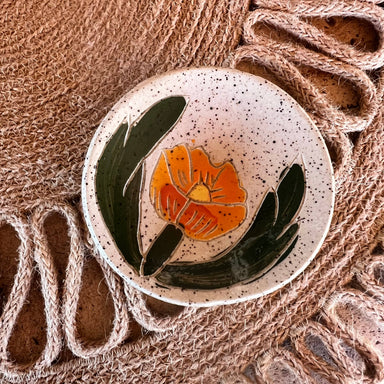 Single Globe Mallow Sgraffito Tea Rest by Tough Kitty Designs, showcasing intricate hand-carved details with an orange flower design, ideal for tea bags or spices.