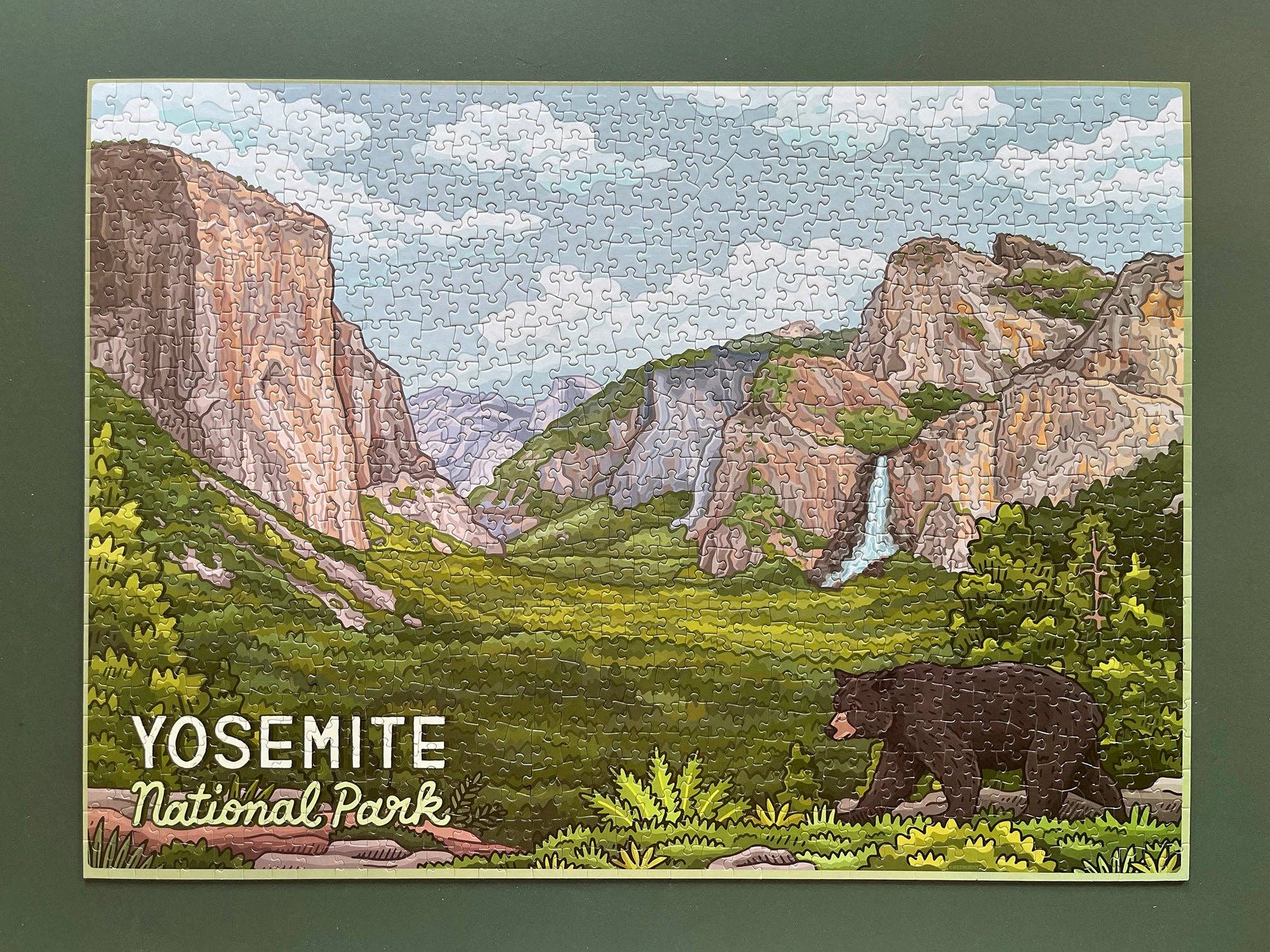 Yosemite national park puzzle with waterfall, bear and rock formations