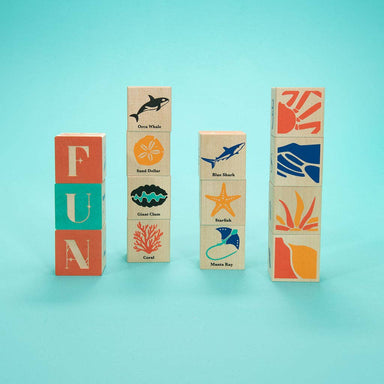 Uncle Goose Ocean Blocks - Dive into the fun with these colorful blocks featuring a blue whale, showcasing playful sea creatures and Art Nouveau letters!