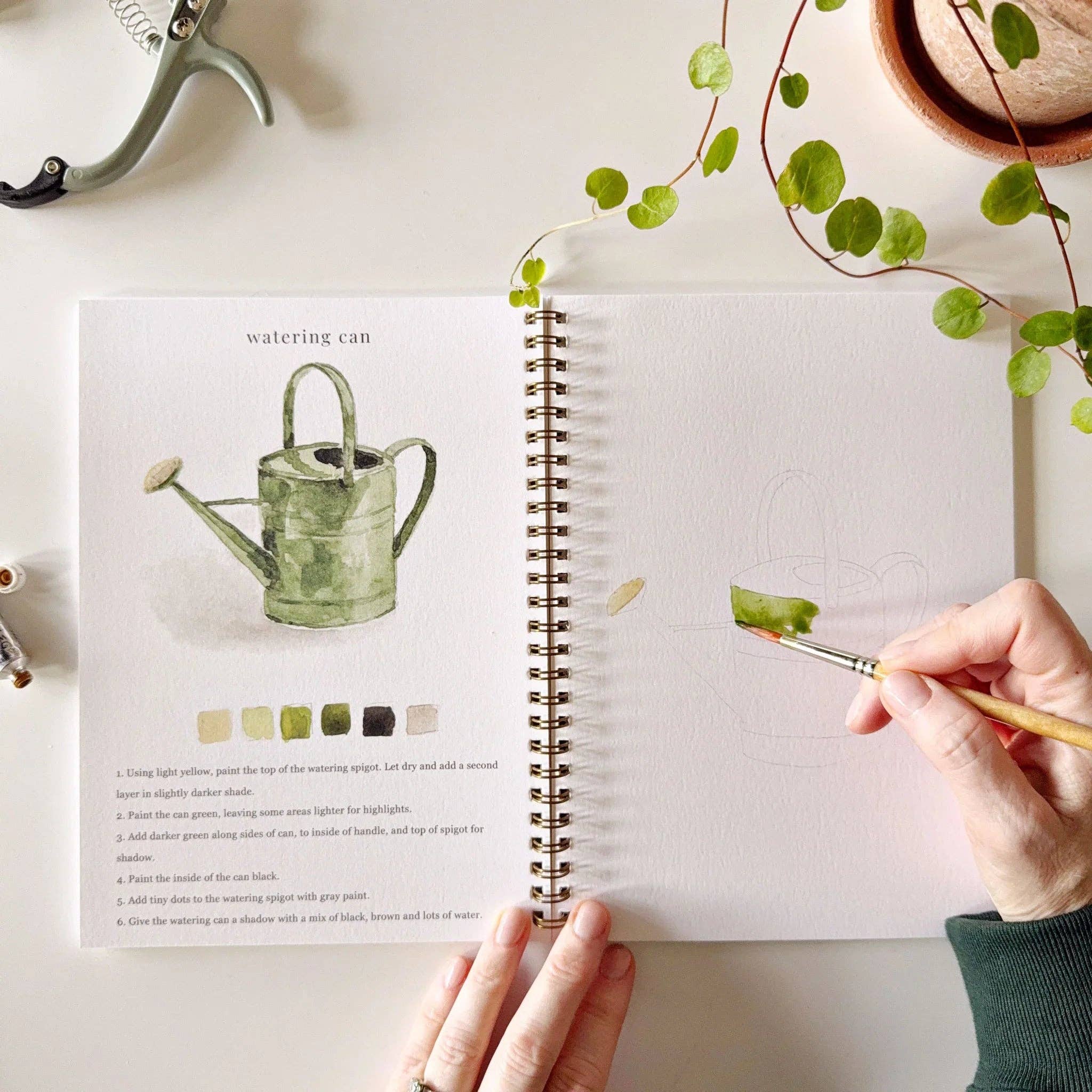 Inside pages of the Garden Watercolor Workbook showcasing outlined sketches ready to be filled with vibrant watercolors, designed for both kids and adults.