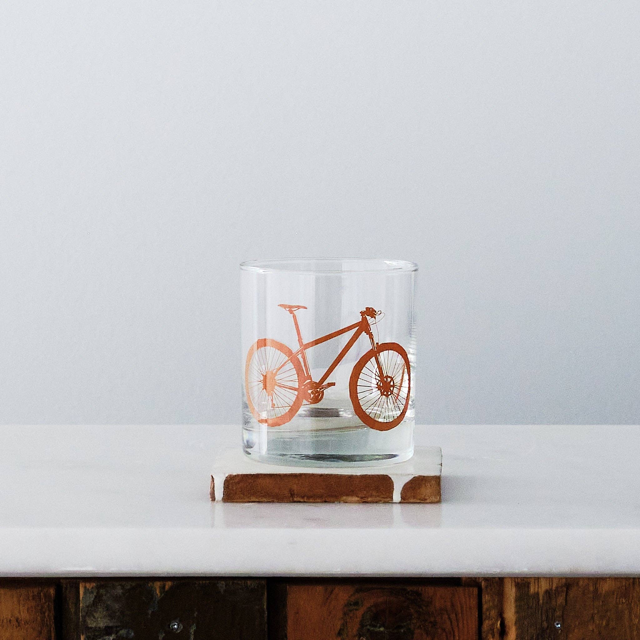 Close-up of Mountain Bike Rocks Glasses showcasing intricate screen-printed design from Vital Industries.