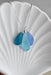 Blue Eco Glass Trio Sterling Silver Necklace showcasing three eco-friendly recycled glass drops in ocean blue colors, perfect for ocean lovers.