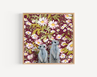 Meerkats fine art print by Emily Uchytil featuring two meerkats surrounded by vibrant floral wallpaper design.