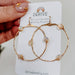 Stargazer Opal Hoop Earrings: These 1.5" hoops offer a texture that’s smoother than your best pickup line, available in 14k gold fill or sterling silver, and guaranteed to be hypoallergenic, because who needs a rash on date night?