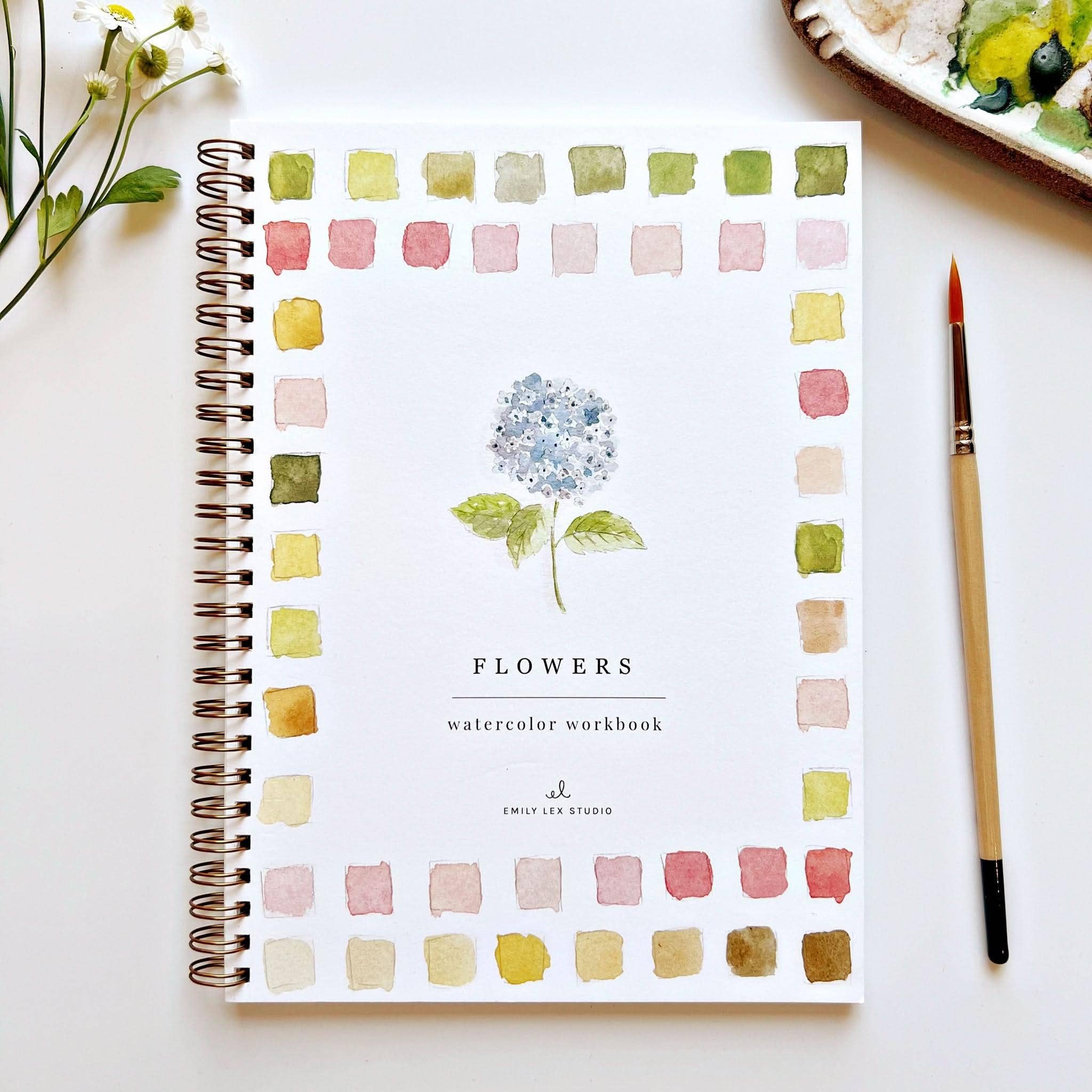 Flowers watercolor workbook showcasing vibrant floral designs with easy outlines for beginners.